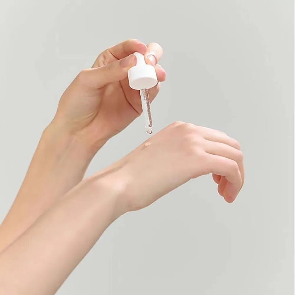 Korean Facial Moisturizing Serum - Snail Mucin Rice Skin